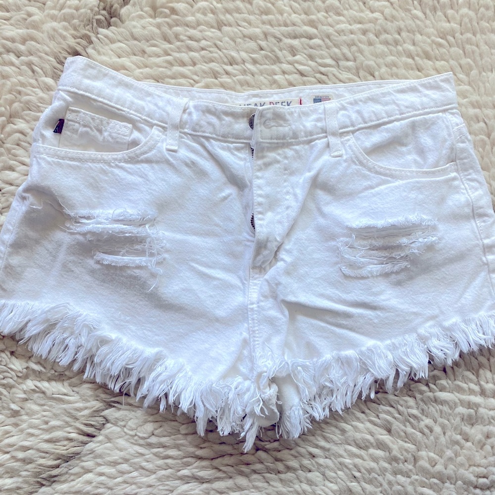 Sneak Peak white denim distressed/destroyed shorts